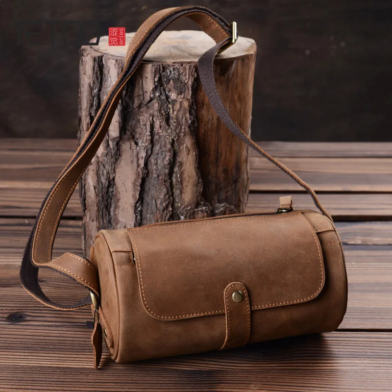 

AETOO Vintage Mad Horse Leather Men's Slash Bag, Leather Cylinder Bag, Handmade Head Layer Psoriasis Barrel Small Chest Bag