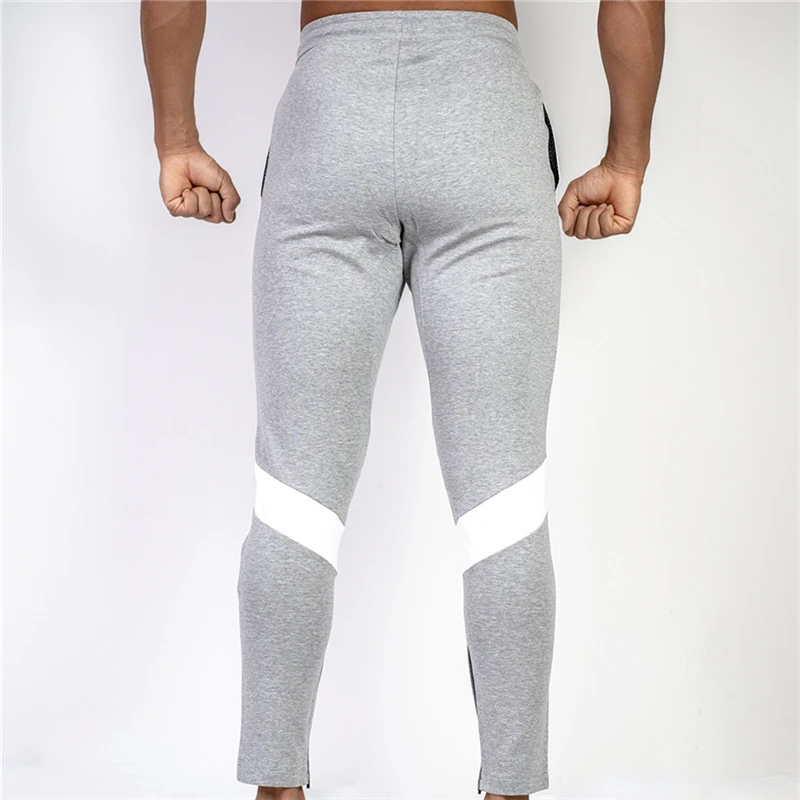 Повседневные спортивные брюки Мужские Jogger Спортивные штаны тренажеры фитнес тренировки Брендовые брюки мужские осенние модные хлопковые спортивные штаны