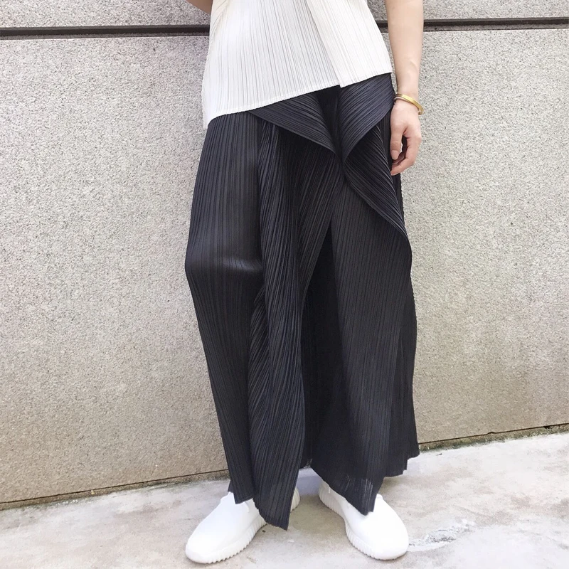 Miyake fold Ранняя осень новая мода индивидуальный дизайн чувство чистый цвет большой код тонкие девять ног Брюки Бесплатная доставка