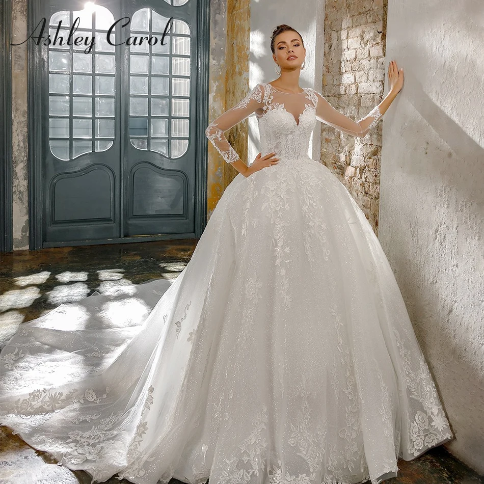 

Ashley Carol Illusion Scoop Long Sleeve Princess Ball Gown Wedding Dress 2019 New Beading Shiny Chapel Train Sexy Wedding Gowns