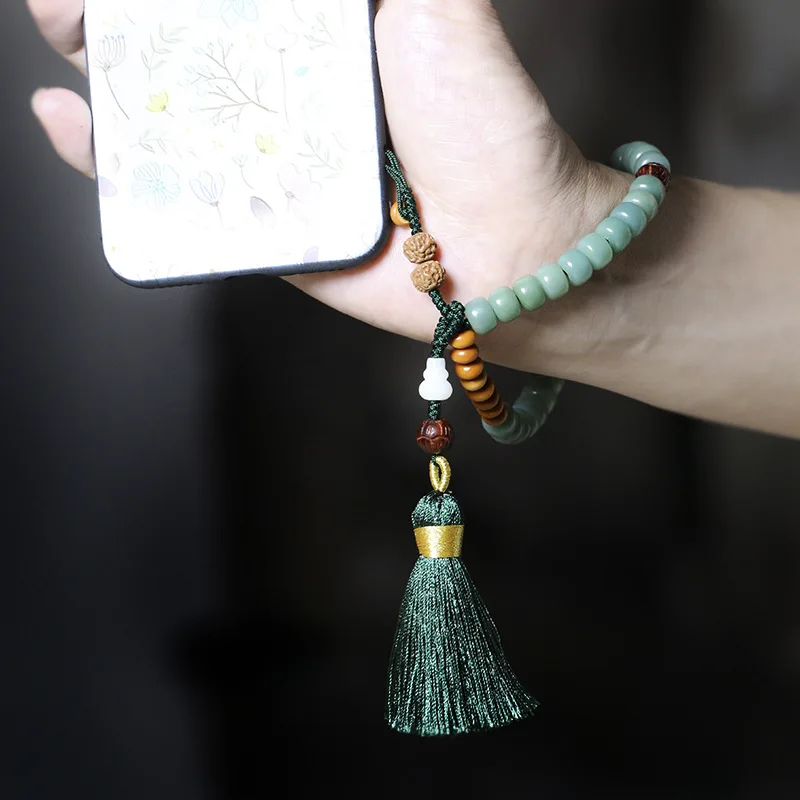 

Tassel mobile phone chain handmade original weathered female leather green bodhi mobile phone lanyard mobile phone shell pendant