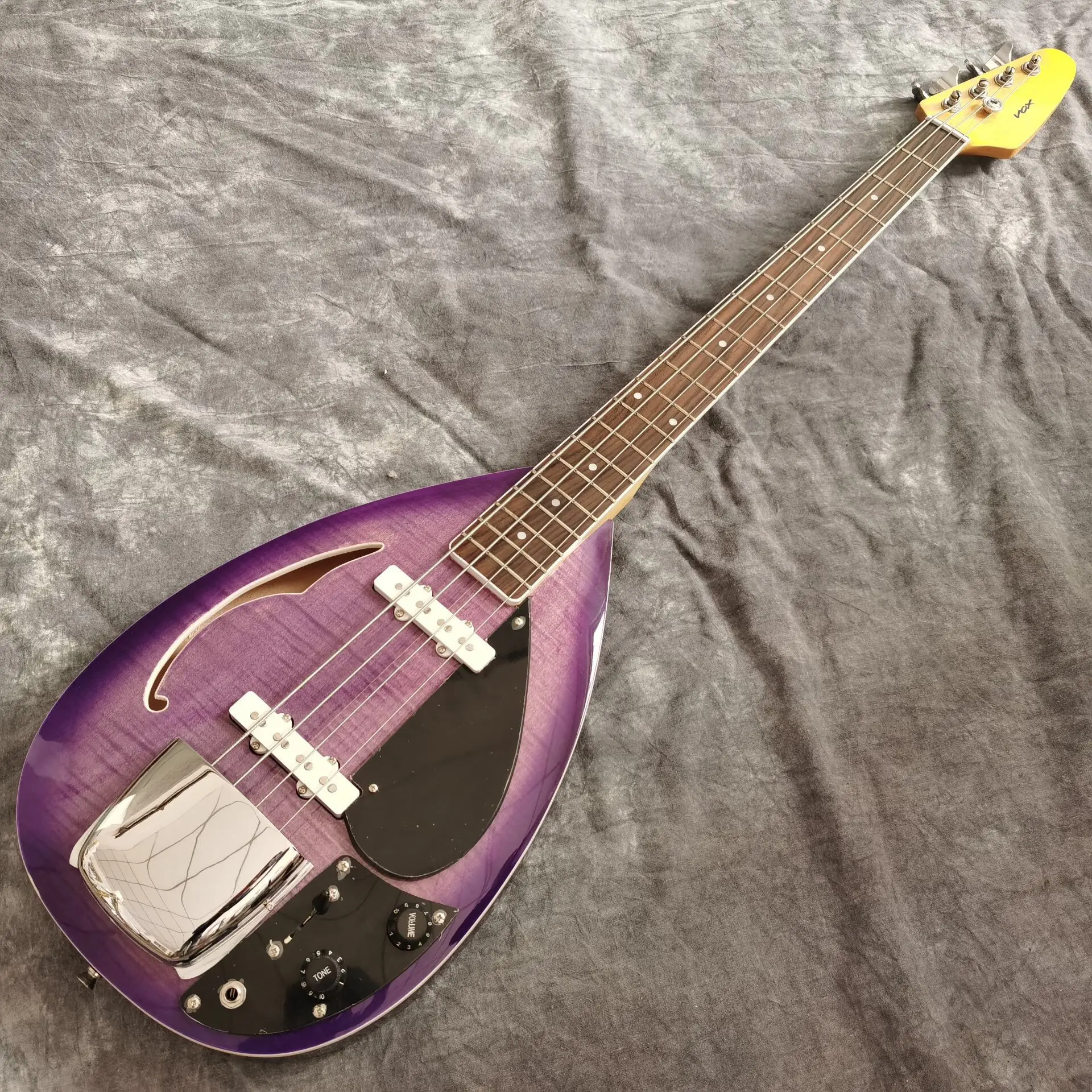 

Electric bass Guitar.handmade 4 stings purple color tiger flame top bass guitarra.high quality pickups.real photos