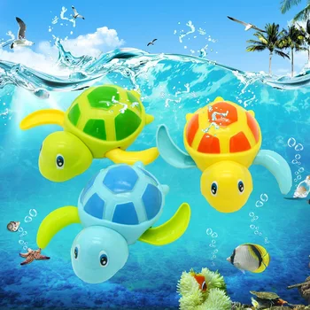 

Cute baby playing water toys children bathing baby swimming boy girl toy floating back and forth swimming little turtle