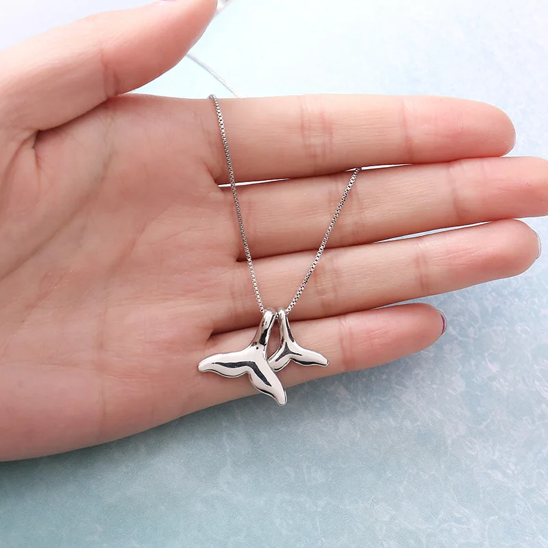 

2019 new predecessor 3 Lin Jia with the same clavicle chain pendant double dolphin tail fresh necklace