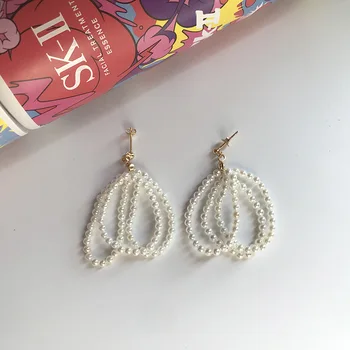 

Silvology 925 Sterling Silver Winding Pearl Circle Long Stud Earrings Nordic Style Fashionable Earrings for Women Luxury Jewelry