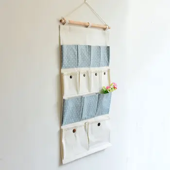 

Beautiful 13 pockets dot multilayer hanging bag With button almirah door sundries flower storage bag basket wall decoration