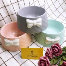 Cuenco de plástico arco mascota de color caramelo productos encantador amarre de Protección Ambiental resistente a la caída impermeable PP gatito cachorro(China)