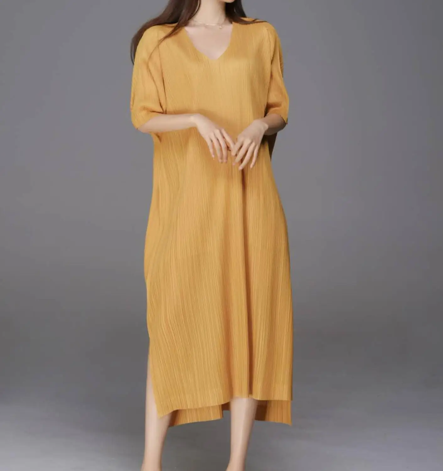 

Spring and Autumn Miyake pleated loose large size slimming temperament age reduction fashion mid - length slit skirt