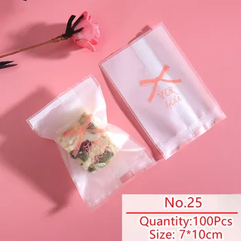 

100pcs/lot Candy Bag Homemade Snowflake Cookies Pack White Frosted Bow Tie Pattern Nougat Party Snack Food Packing Bags