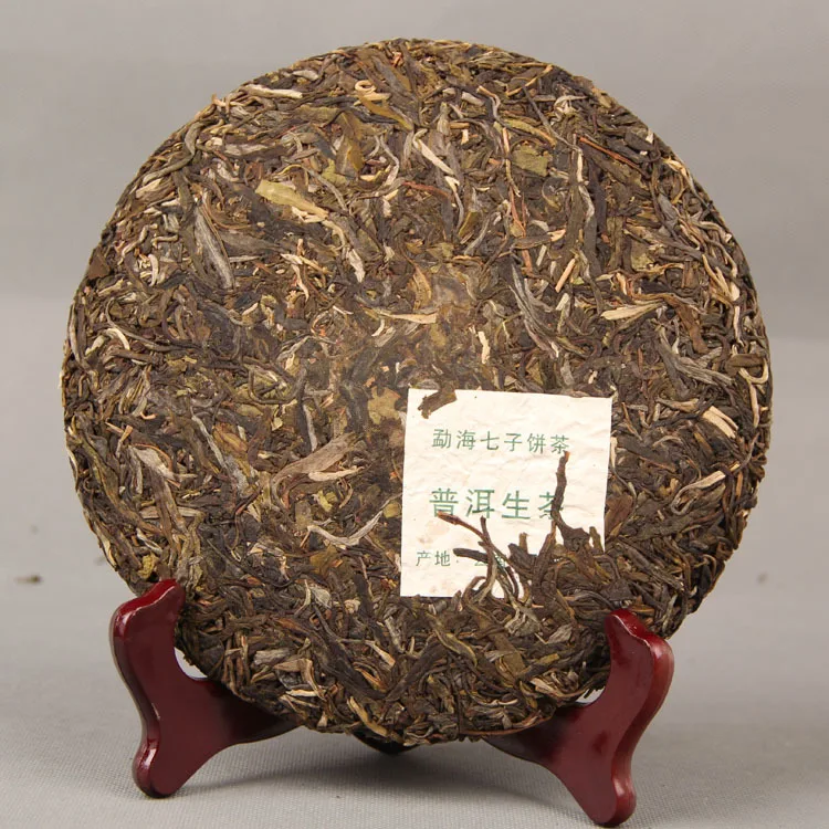 Menghai Ранняя весна сырой Pu-erh Nannuo горный Qizi чай торт 357 г Shen Pu'er чай