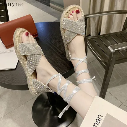 

Korean version of rhinestone cross belt open toe flat bottom fashion soft bottom wild sandals tide