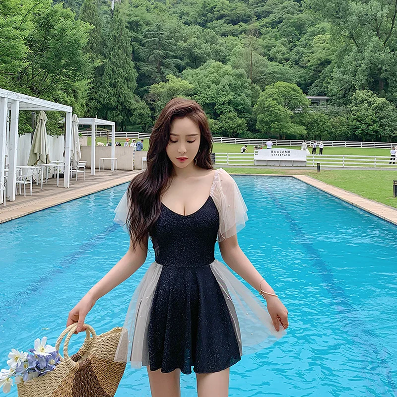 

Black One-piece Swimsuit, Short Sleeves, High Waist, Padded Skirt, Female, Nude Back
