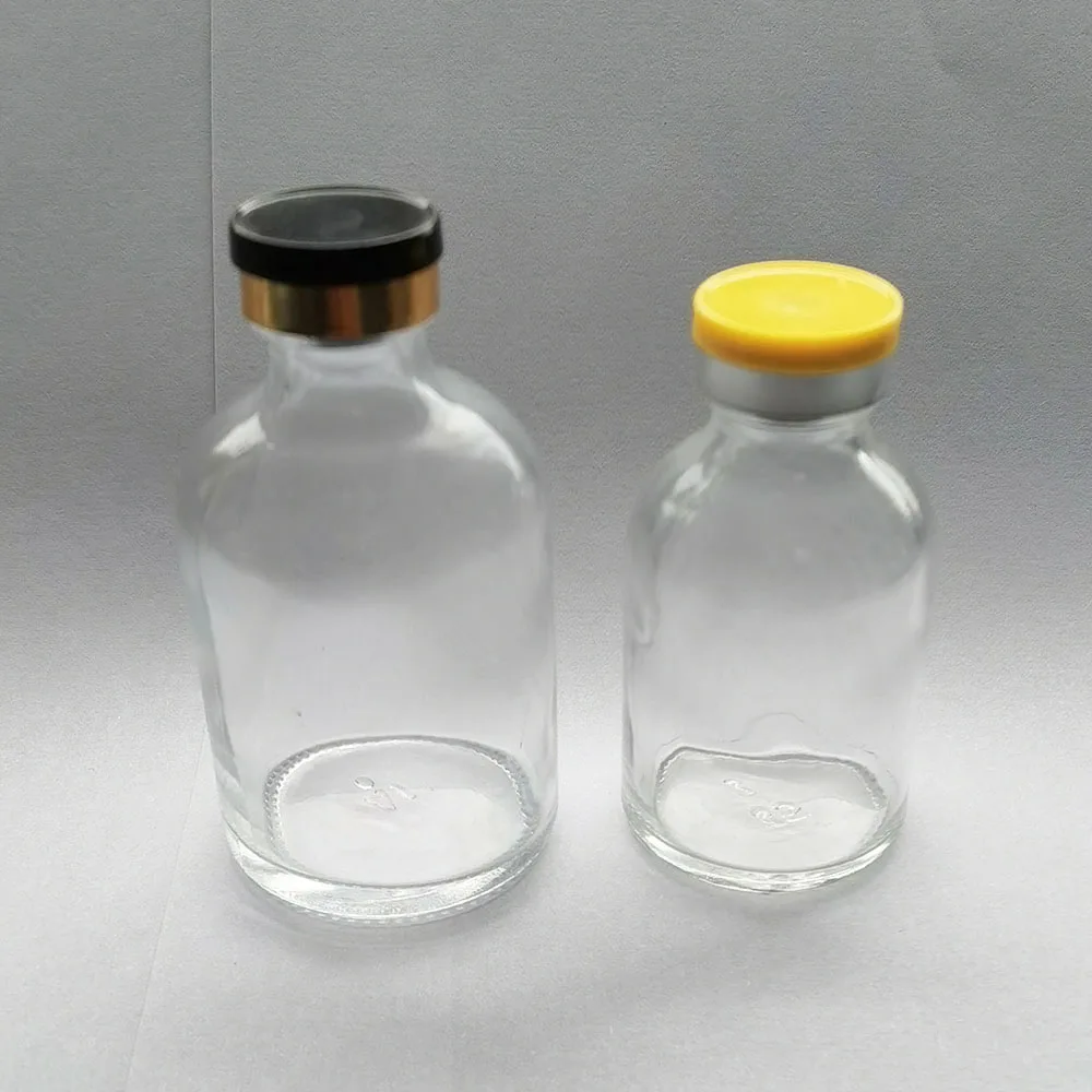 https://ae01.alicdn.com/kf/Hbff60749370d4c86a1cd882a124d9f9ad/Empty-100ML-50ML-30ML-Transparent-Injection-Glass-Vial-with-Plastic-Aluminium-Cap-1oz-Clear-Liquid-Medicine.jpg