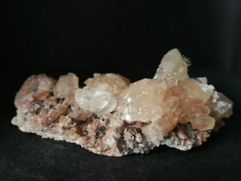 

150.0gMineral samples of natural pink calcite and pyrite Association