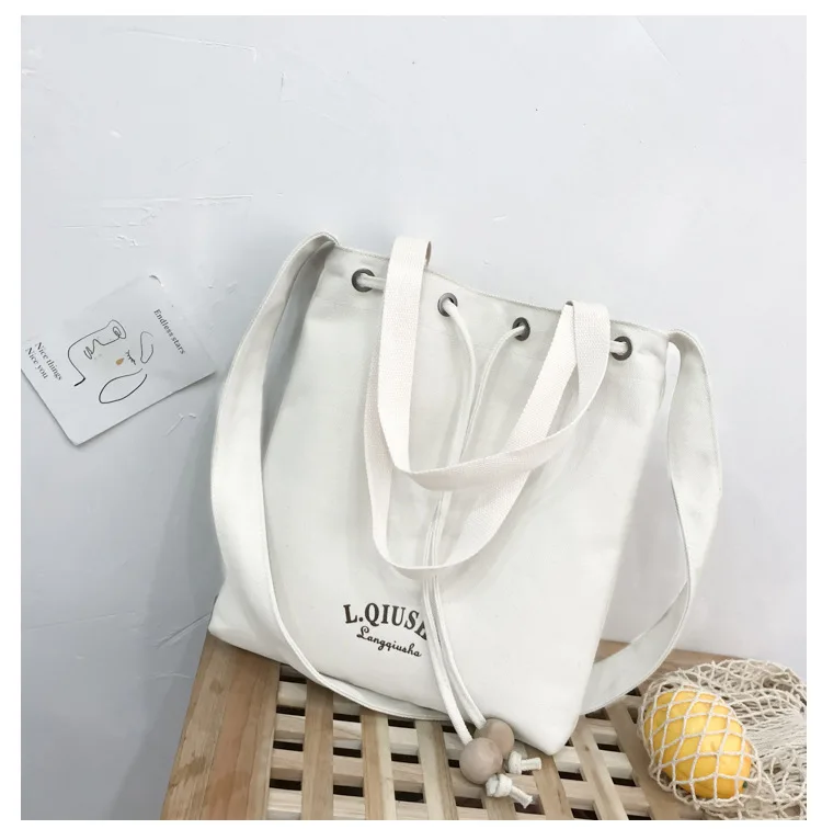 

2019 Autumn And Winter New Style Fashion Wooden Bead Drawstring Bucket Canvas Bag Korean-style Student Shoulder Bag Shoulder Clo