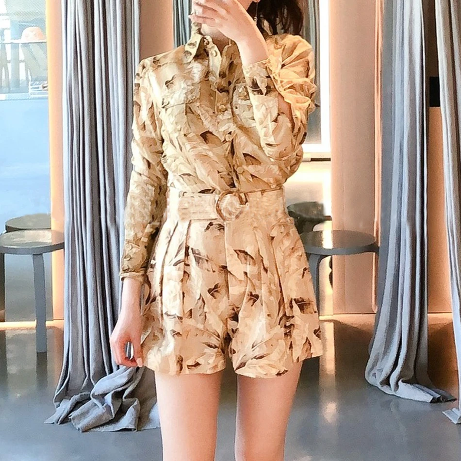 Winter New Casual Printed Button Short Jumpsuit Female Lapel Long Sleeve High Waist Belt Sexy Sweet Style Jumpsuit