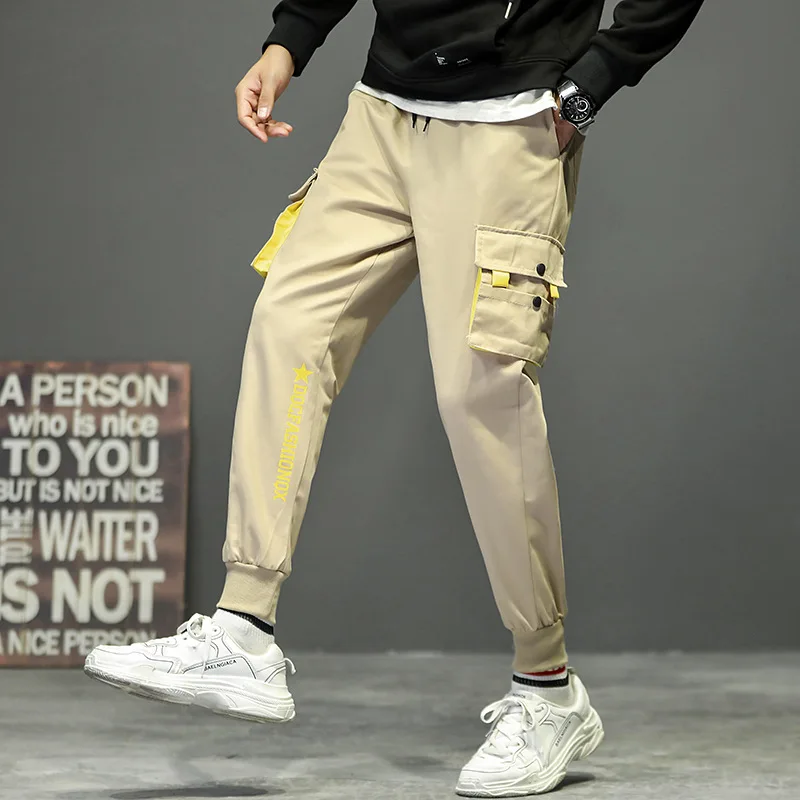 

Four Seasons Paragraph Casual Cargo Trousers Men's Japanese-style Loose Elastic Waistband English Printed Trousers Thread Closin