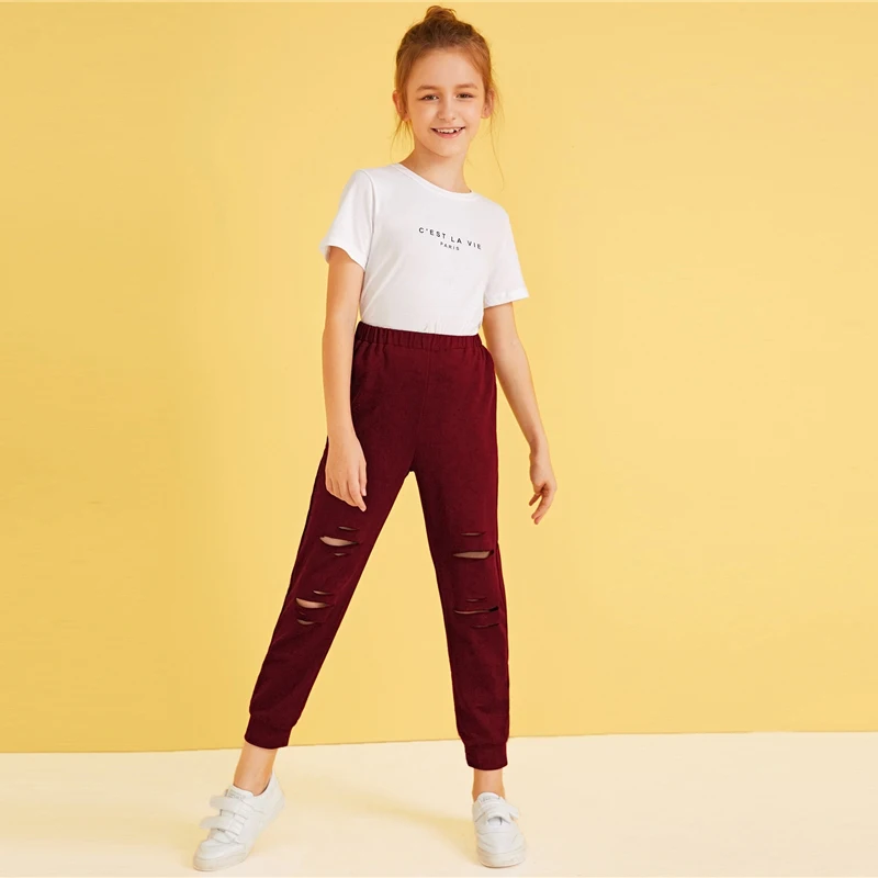 SHEIN для малышей однотонные рваные укороченные Повседневное спортивные штаны детские штаны Осенняя уличная одежда с эластичной резинкой на талии брюки для девочек-подростков