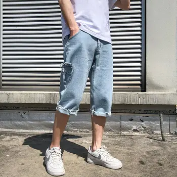 

EWQ / men's wear loose 2020 spring summer new irregular raw edges ankle-length blue jeans with holes for male korean tide 9Y1694