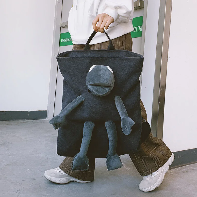 

Backpack men and women 2020 new frog doll rucksack college students personality wild large capacity schoolbag tide harajuku bag