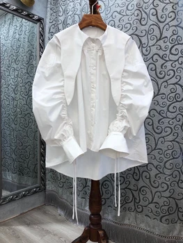 

2020 autumn and winter new women's irregular pointed lapel stitching sleeves wrinkled solid color long-sleeved shirt 908