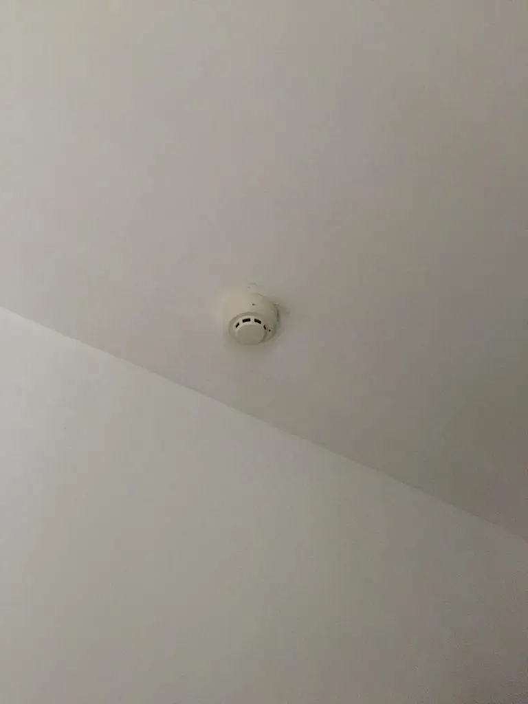 Mini camera installed in indoor corridor