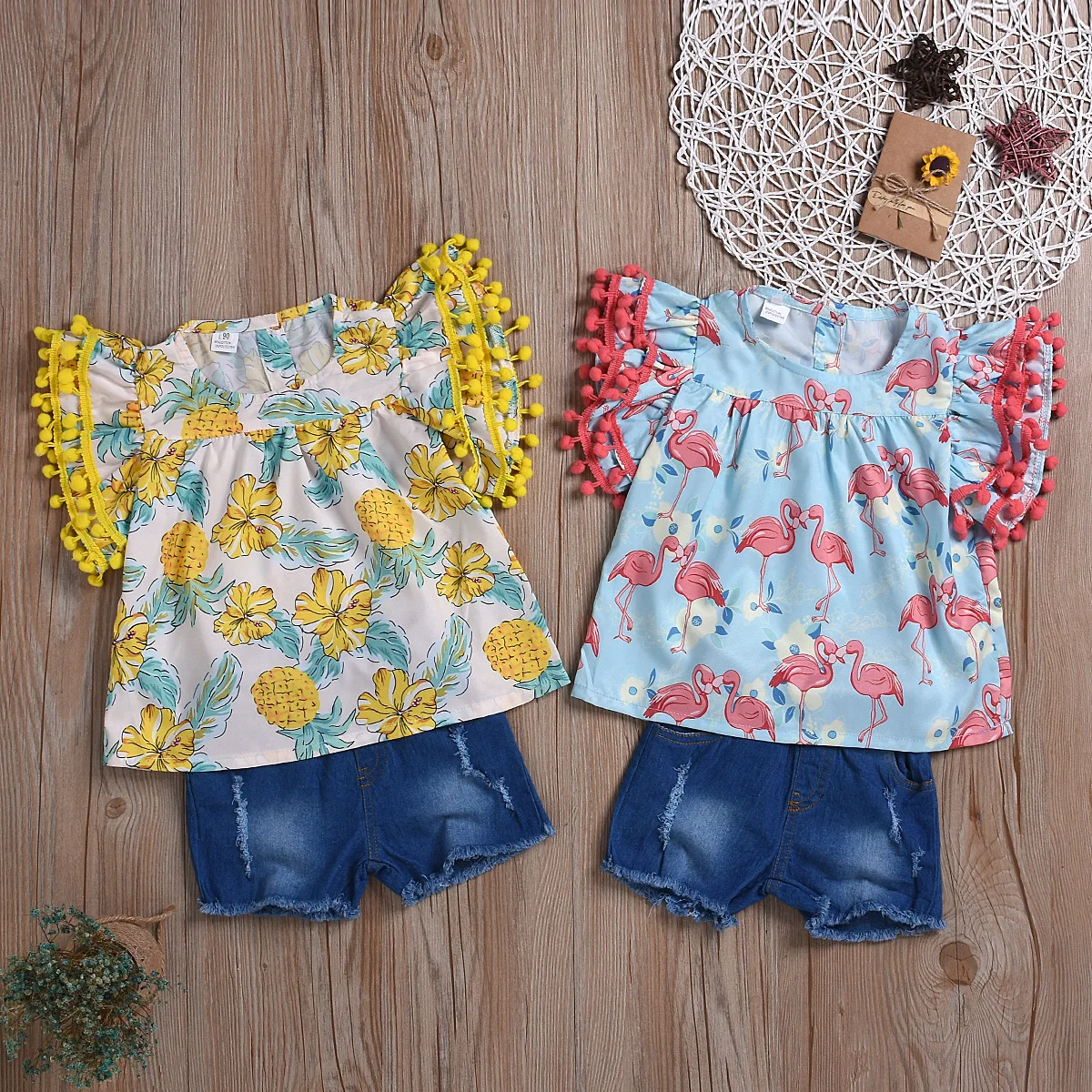 

Childrenswear 2019 Summer Europe And America Girls' Short-sleeved Suit Printed Short-sleeved Top Denim Shorts Two-Piece Set