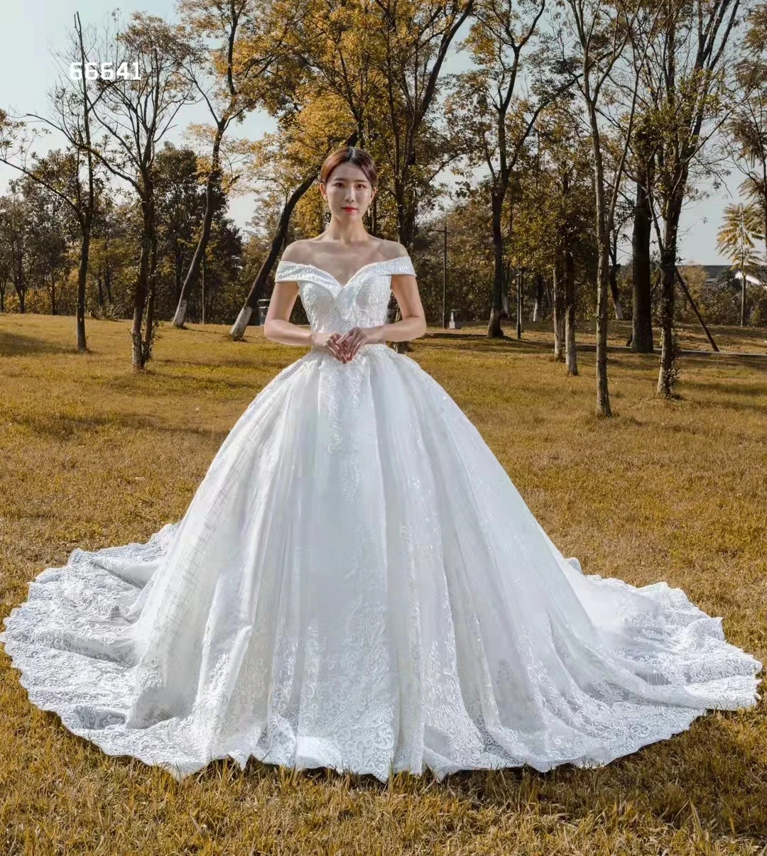 

RSM Collection Luxury Elegant V-neck Off The Shoulder Bridal Wedding Dress 2021 Draped Backless Lace Applique Long Trailing Skir