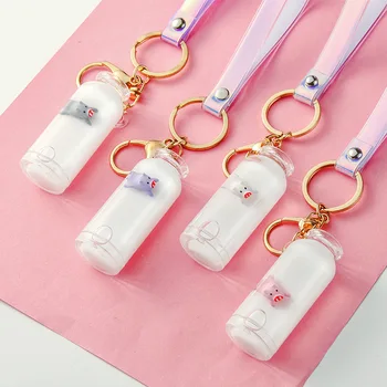 

Car Key Chain Shaking Voice Network Red Floating Milk Pigskin Liquid Quicksand Bottle Oil Piggy Pigskin Handbag Pendant