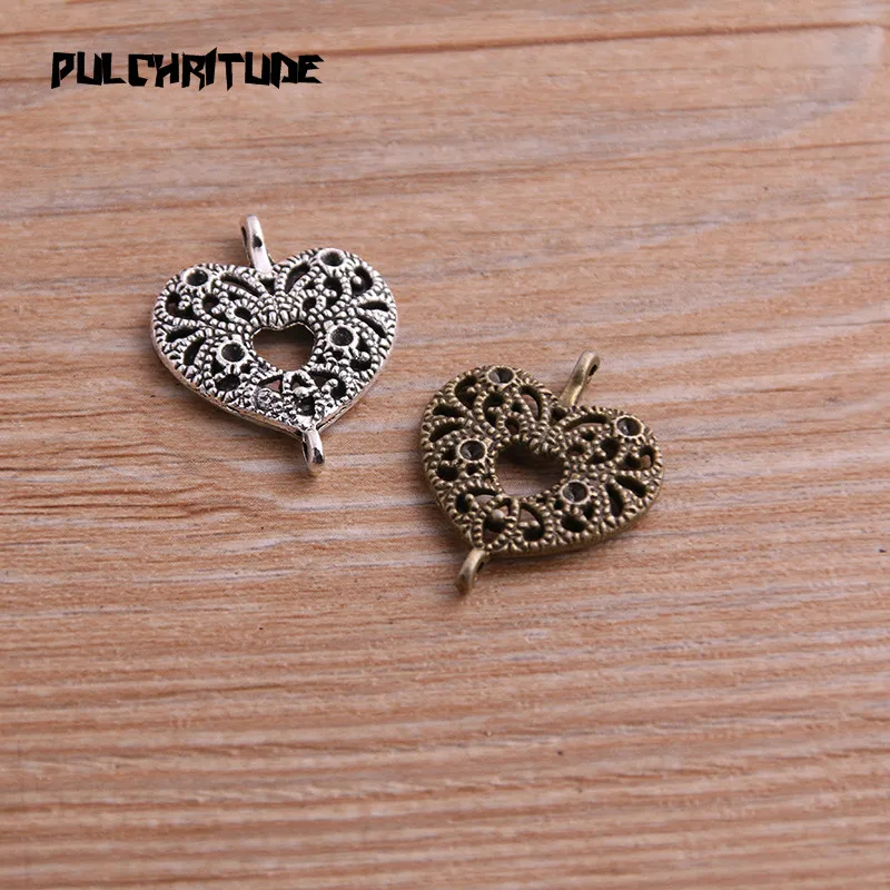 

PULCHRITUDE 12pcs 19*23mm Two Color Zinc Alloy Necklace Charm Women Jewelry Fashion DIY Hollow Heart Connector Pendant Necklace