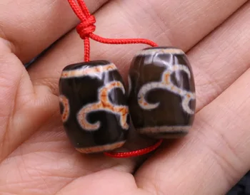 

pair of Energy Tibetan Old Agate Lotus Love Symbol dZi Bead Amulet