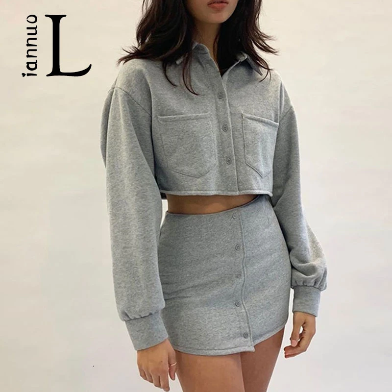 

Sexy 2 Two Pieces Matching Sets Long Sleeved Pockets Sweatshirt Crop Tops And Bodycon Mini Skirt Fashion Buttons Tracksuits