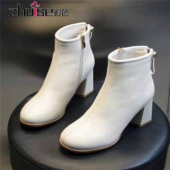 

Autumn and winter Hong Kong fashion brand women's boots leather round toe short boots female wild net red thick heel high heels