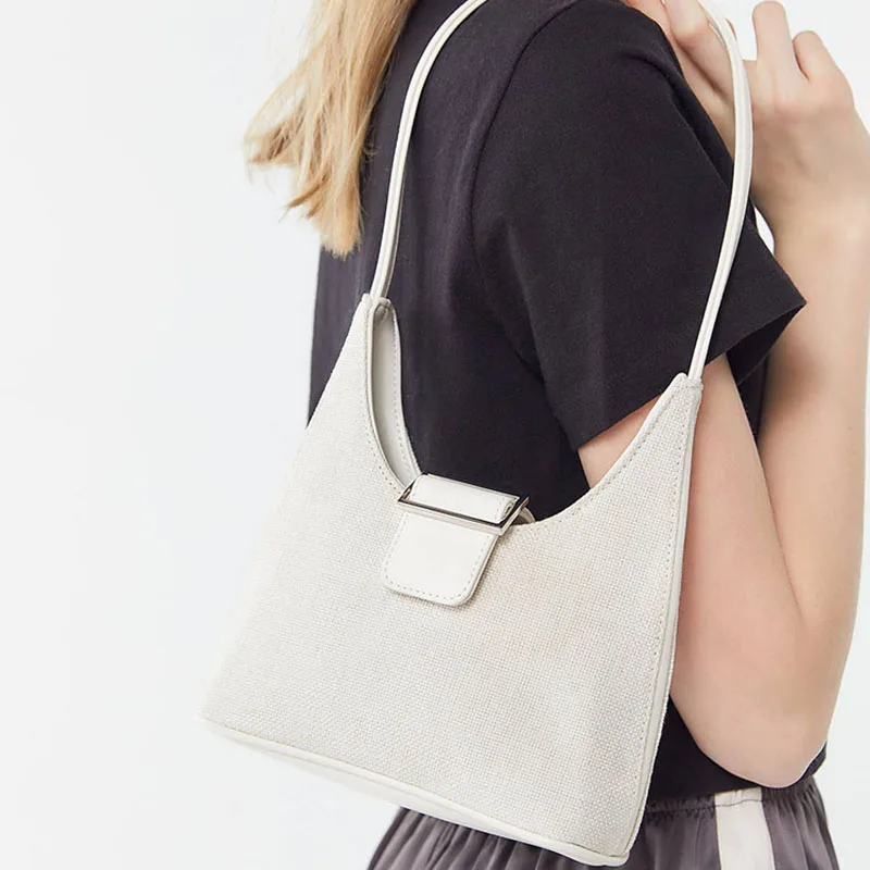 

Niche summer simple wild canvas woman bag Tot dumplings under the shoulder bag 2019 new button handbag