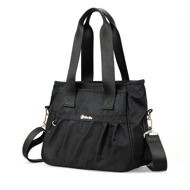 

Casual Fashion Nylon Bag Women's Large Capacity Lightweight Commuting Shoulder Bag Trend Versatile Travel Hand Shoulder Bag