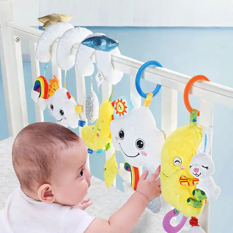 cot bed musical toys