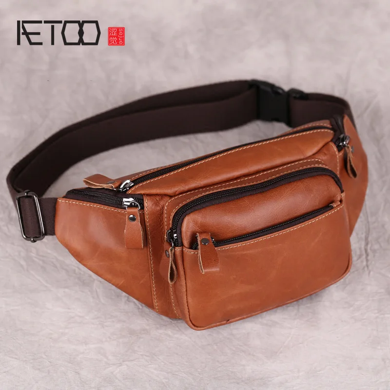 

AETOO Leather waist hanging bag, men's multi-functional head leather breast bag, casual stiletto bag, sports trend men's bag