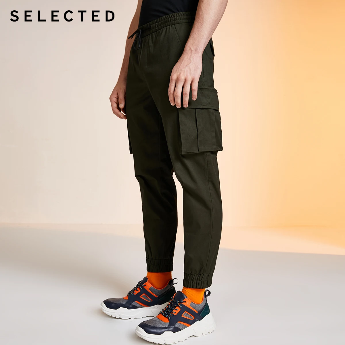 Мужские эластичные брюки с несколькими карманами и вышивкой на лодыжке S | 419414563