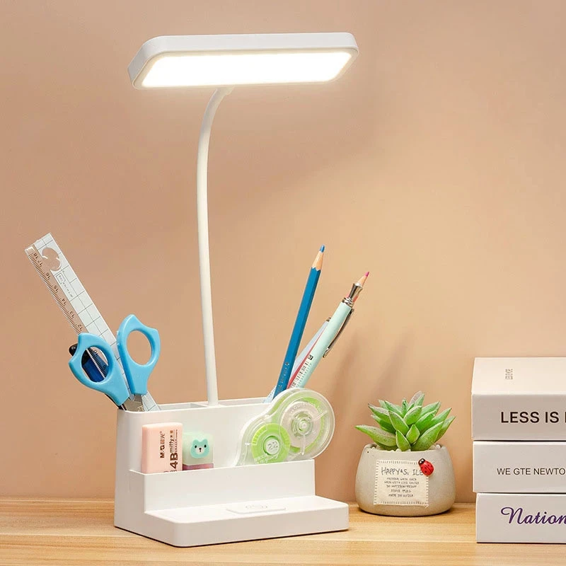 Lâmpada de mesa led para crianças c suporte para canetas.