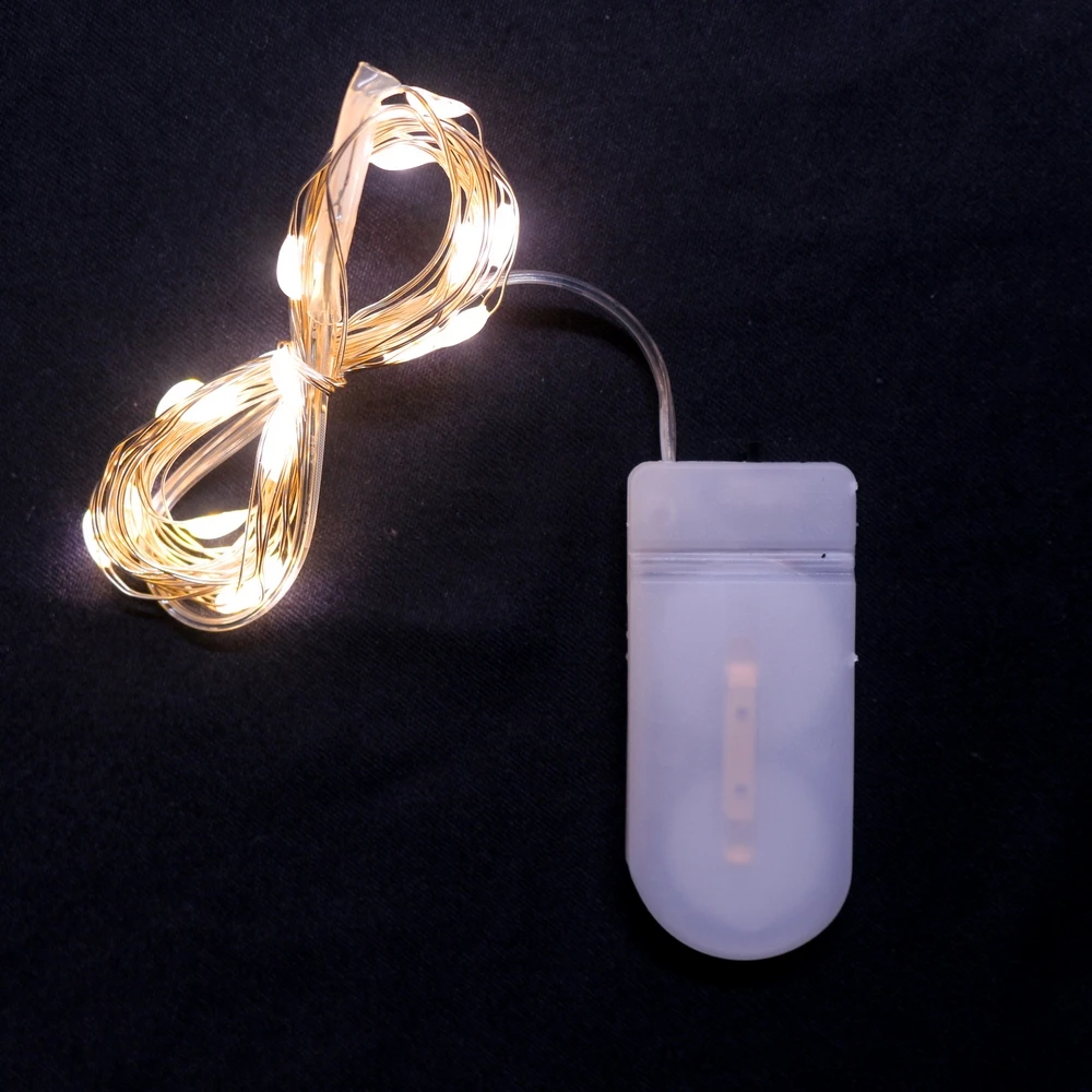 

Free shipping NEW 1M 2M 5M CR2032 Battery LED Holiday String Lights Fairy Garland For Christmas Wedding Party Home Decoration