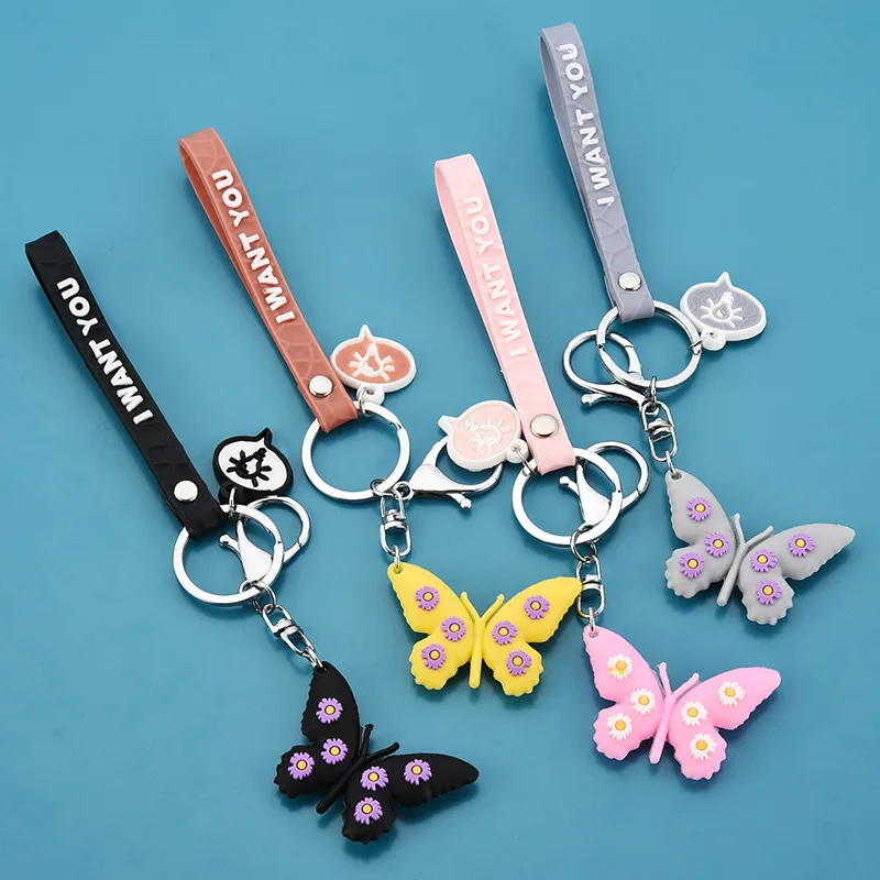 

New PVC Keychain Soft Plastic 3D Doll Accessories Small Daisy Key Pendant School Bag Creative Butterfly Keychain