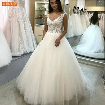 

Delicate African Ivory Beaded Wedding Gowns O Neck Appliqued Beaded Sleeveless Bride Dress White Princess Arabia Wedding Dresses