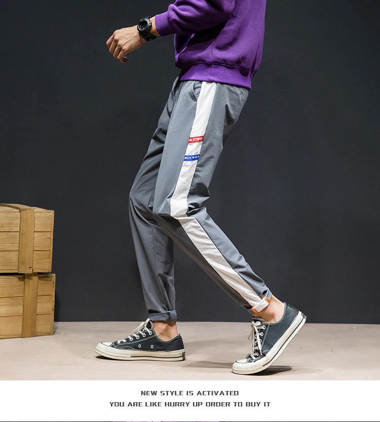 Men's fashion sweatpants vertical stripes decoration loose spring and autumn sports pants casual male jogger streetwear
