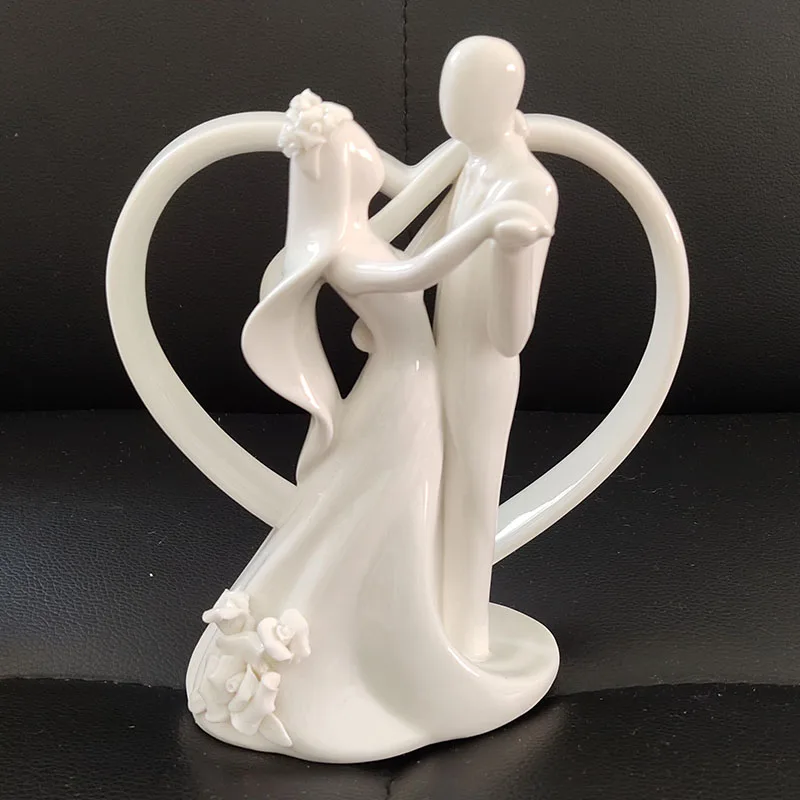 

Romantic Wedding Dancing Bride and Groom Couple With Heart Arch Ceramic Cake Topper Wedding Figurines Party Favor