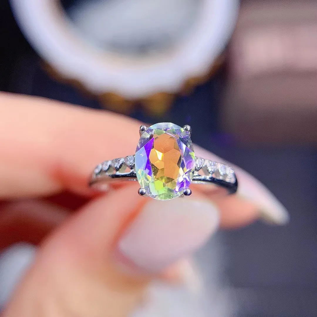 Mystic Topaz Celestial Ring Round Cut with Sun Moon and Star Design ⋆  Laurie Sarah