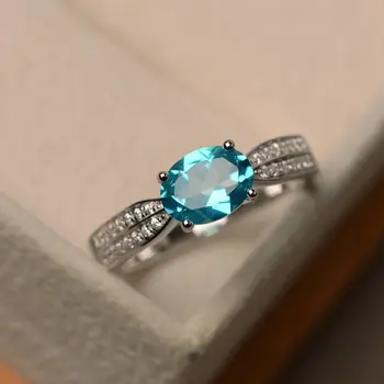 

European and American S925 Silver Ring Female Oval Swiss Blue Topaz Blue Diamond Zircon Ladies Simple Personality Jewelry