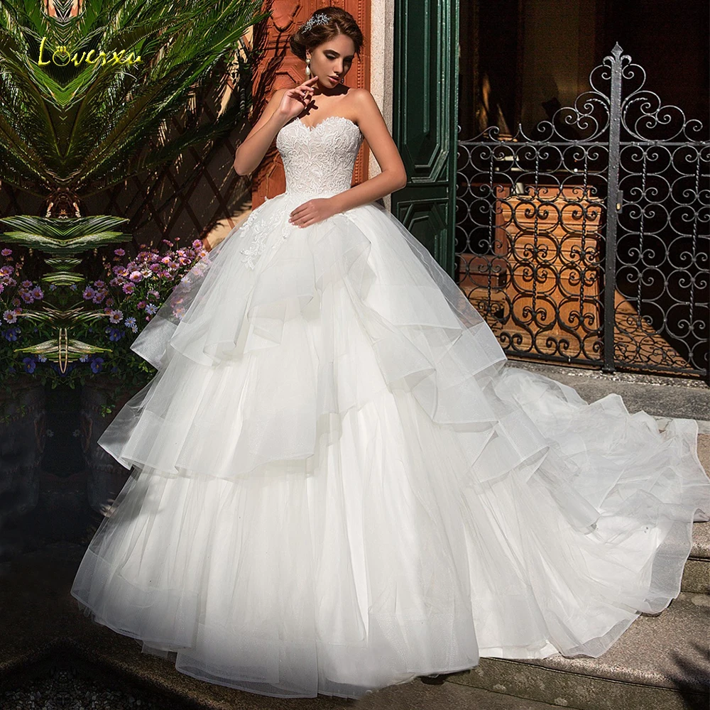 

Loverxu Sweetheart Ball Gown Wedding Dresses 2019 Appliques Sleeveless Lace Up Court Train Ruched Organza Bridal Gowns Plus Size