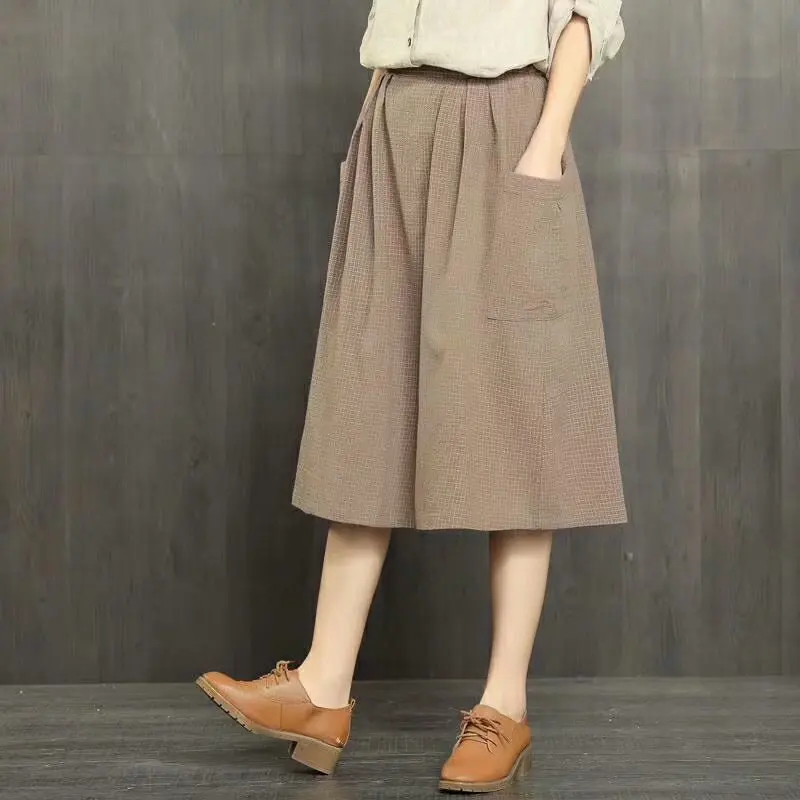 

Spring Clothing New Style Literature And Art Plaid Cotton Linen Skirt Women's Loose-Fit Elastic Waist Large Pocket A- line Mediu