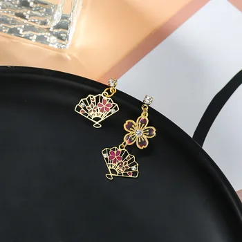 

2020 Vintage style asymmetric flowers New Women earrings joker Hollow metal slice modelling sweet Drop earrings