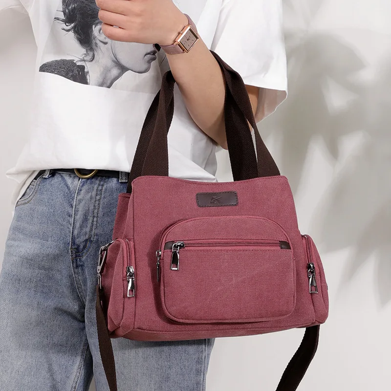 

handbag Single shoulder slung portable canvas casual large capacity fashion 2019 new JULIN
